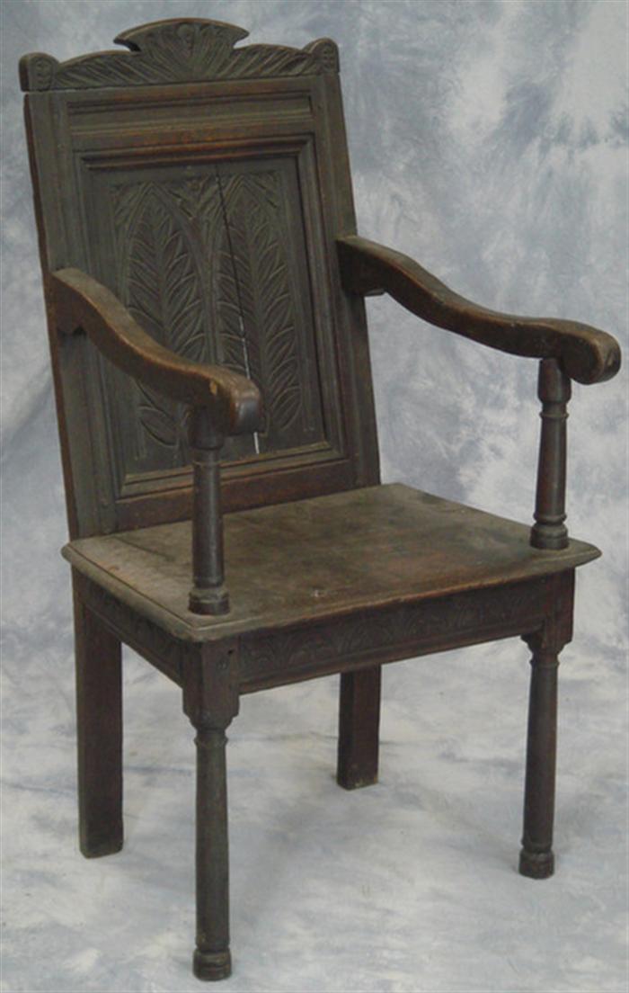 Appraisal: Oak wainscote chair relief carved back solid seat turned legs