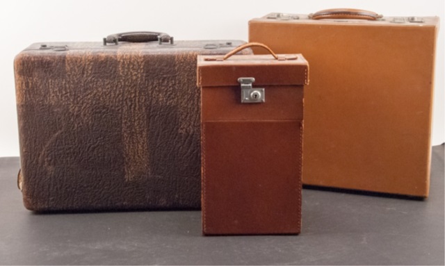 Appraisal: Three Suitcases One is a partial travel vanity set Largest