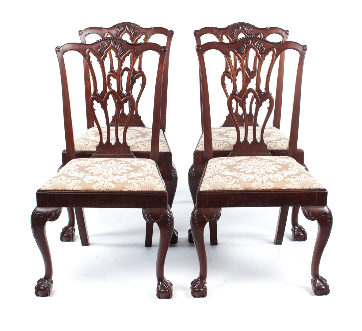 Appraisal: Four Gothic-Chippendale style mahogany side chairs in the Massachusetts manner