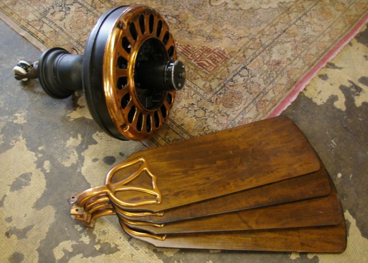 Appraisal: American Matte Black-Painted and Copper-Mounted Stained Maple Four-Blade Ceiling Fan