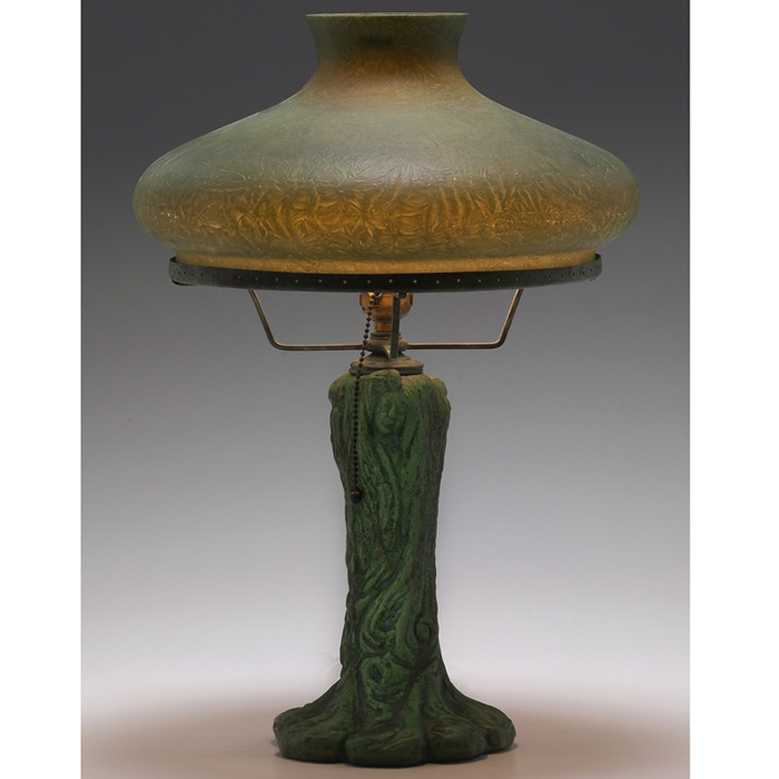 Appraisal: Wheatley Handel table lamp Wheatley pottery base with three sculpted