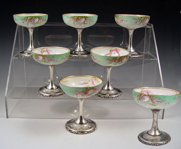 Appraisal: MAUSER STERLING BASE PORCELAIN SHERBERT DISHES Mauser sterling base and