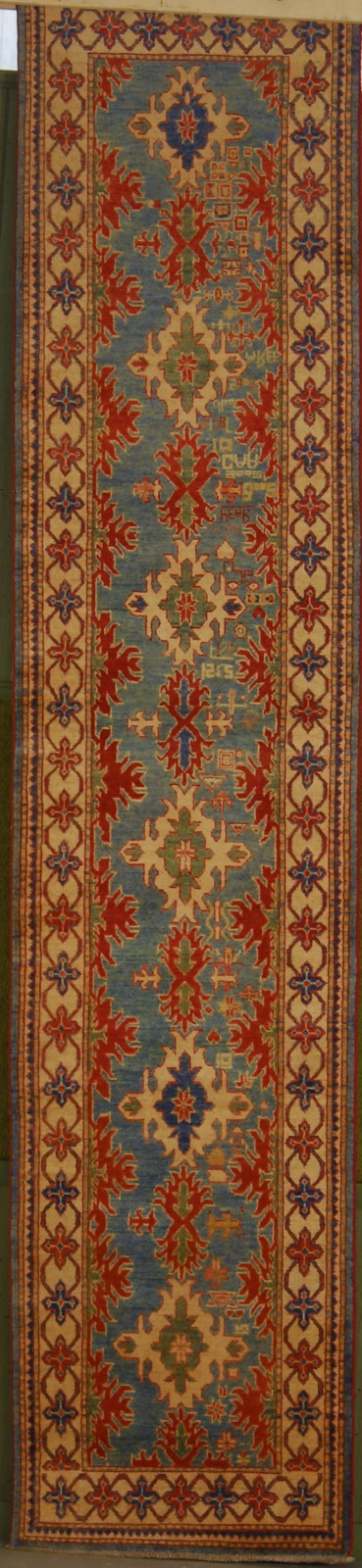 Appraisal: ORIENTAL RUG KAZAK DESIGN ' x ' Series of angular