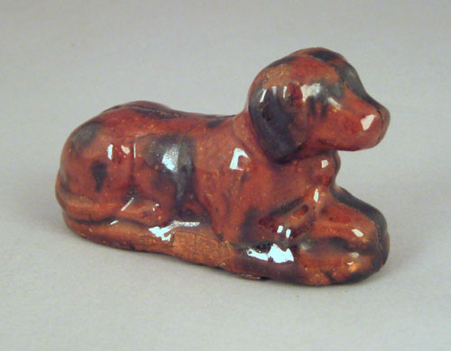 Appraisal: Pennsylvania redware figure of a dog th c h w