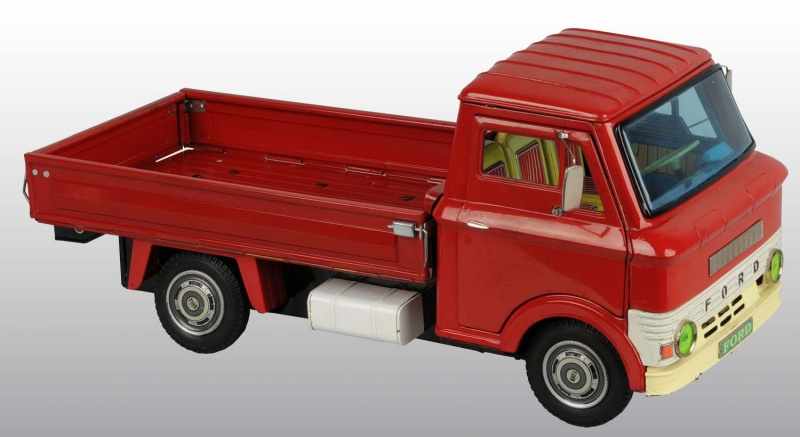 Appraisal: Tin Ford Pickup Truck Friction Toy Description Japanese Mechanism is