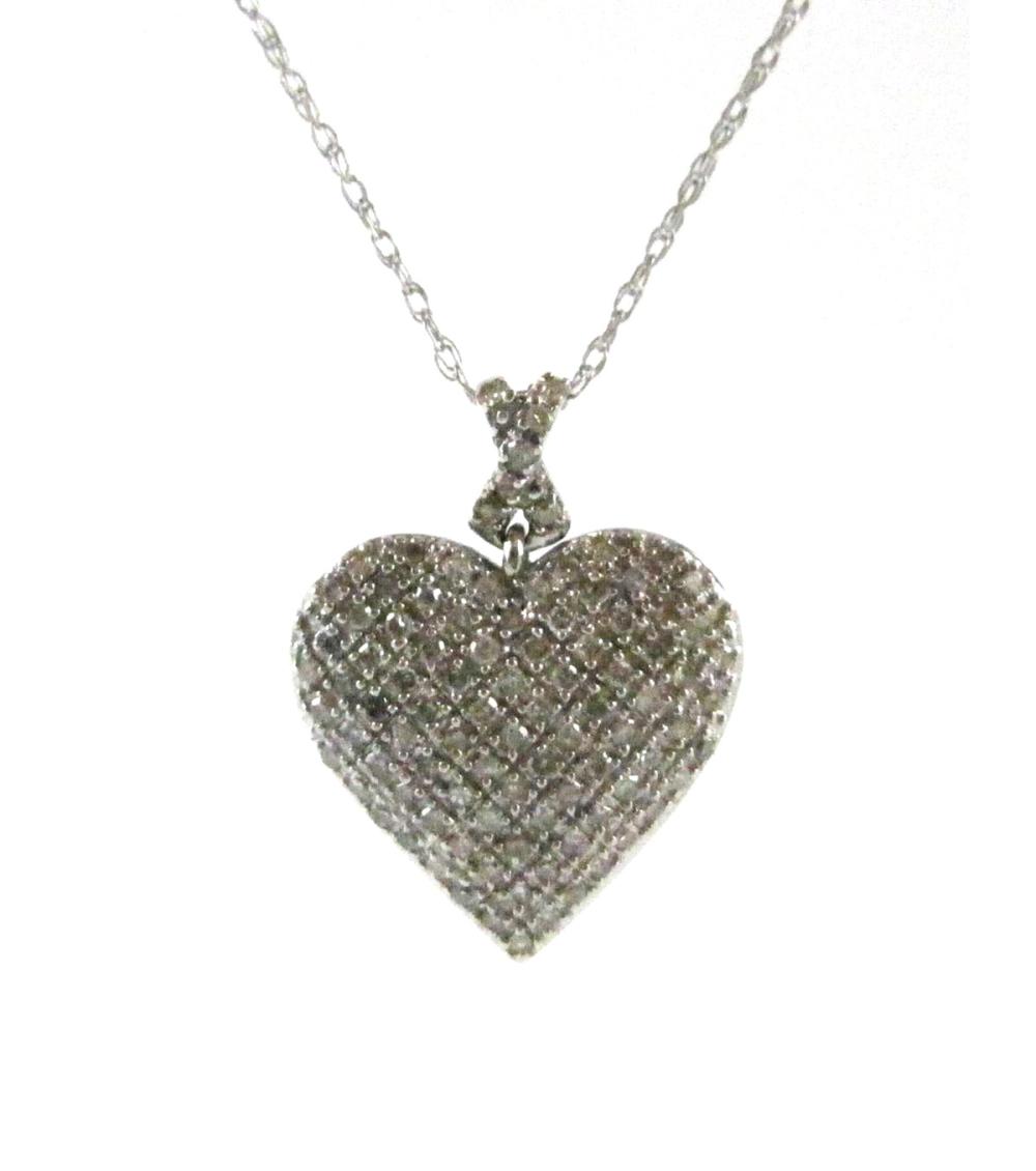 Appraisal: DIAMOND AND FOURTEEN KARAT WHITE GOLD HEART PENDANT NECKLACE the