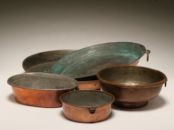 Appraisal: Five copper pieces two shallow pans two dovetailed bowls one