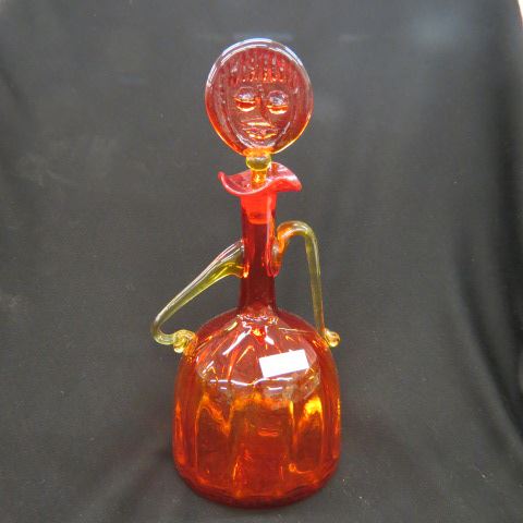 Appraisal: Art Glass Decanter vivid orange with yellow trim figural stopper