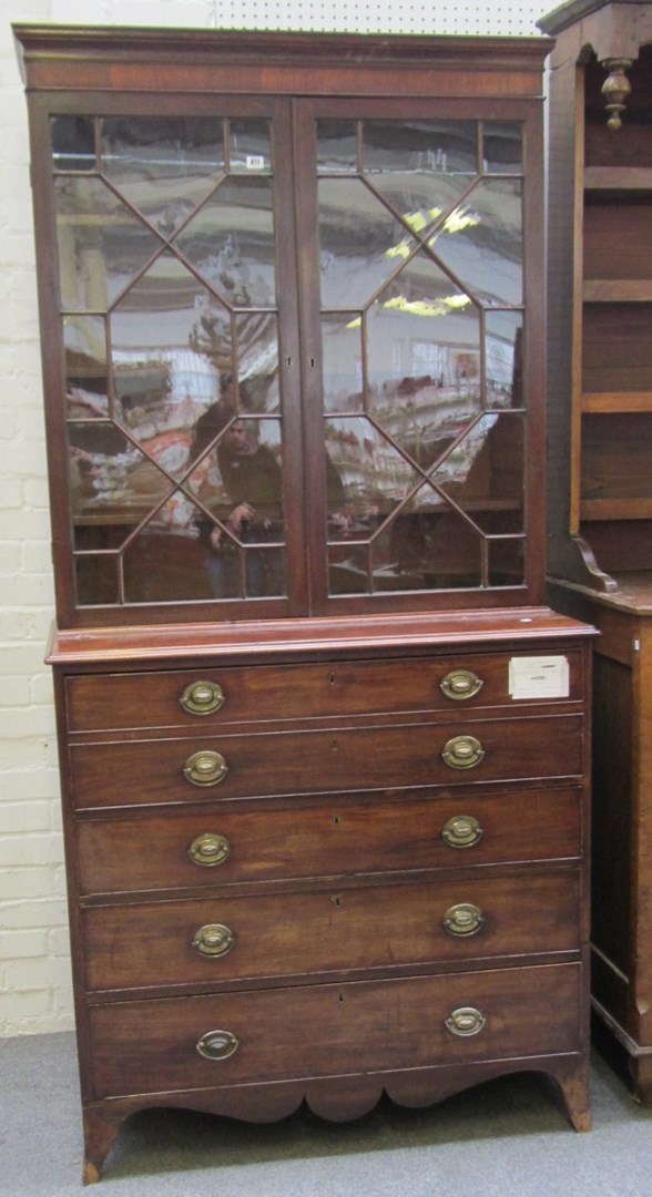 Appraisal: A Regency mahogany secretaire bookcase chest the pair of glazed