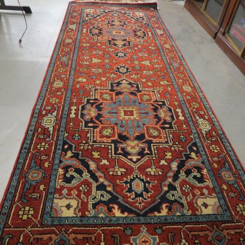 Appraisal: Serapi Persian Handmade Runner two geometric medallions with stylized flowering