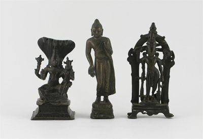 Appraisal: A bronze figure of Buddha Sakyamuni standing in tribhanga his