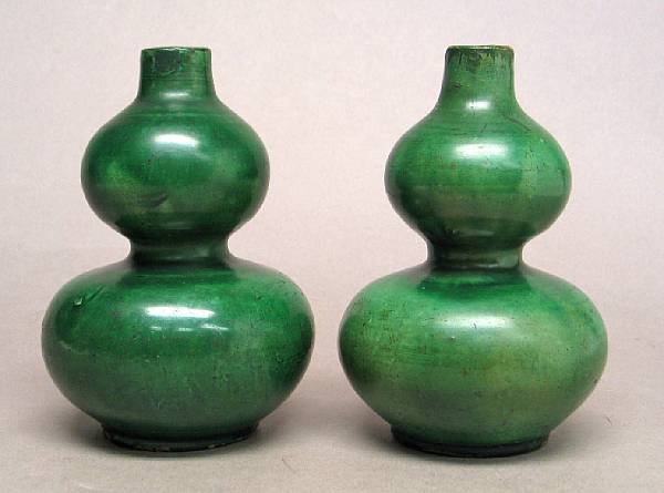 Appraisal: A pair of green glazed porcelain vases Qing Dynasty In