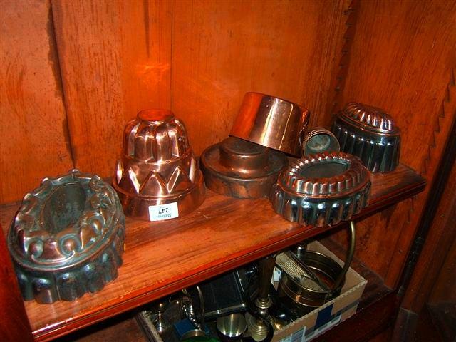 Appraisal: A collection of tin and copper jelly moulds to include