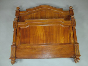 Appraisal: A French walnut double bedstead th century with gadrooned shaped