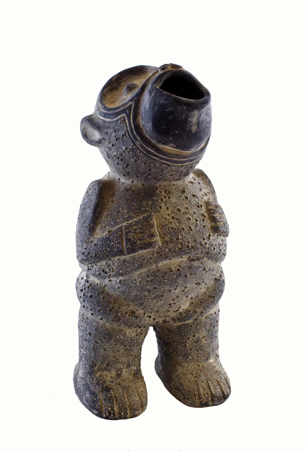 Appraisal: PRE-COLUMBIAN STYLE BLACK POTTERY FIGURE OF A HOWLING MONKEYThe standing