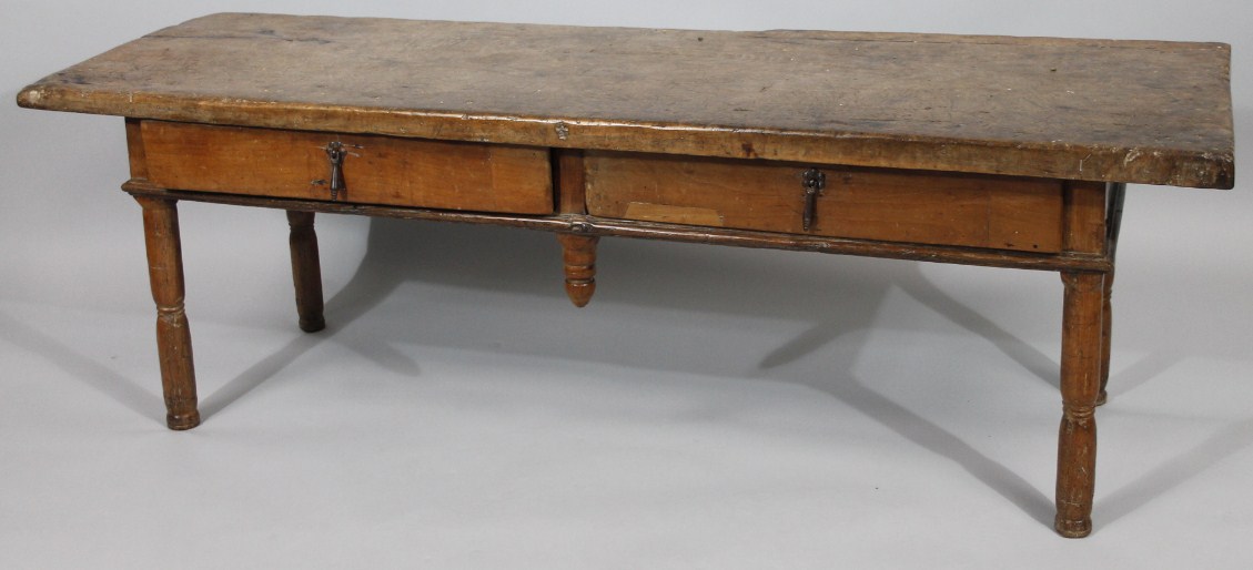 Appraisal: An unusual rustic side table with a thC plank top