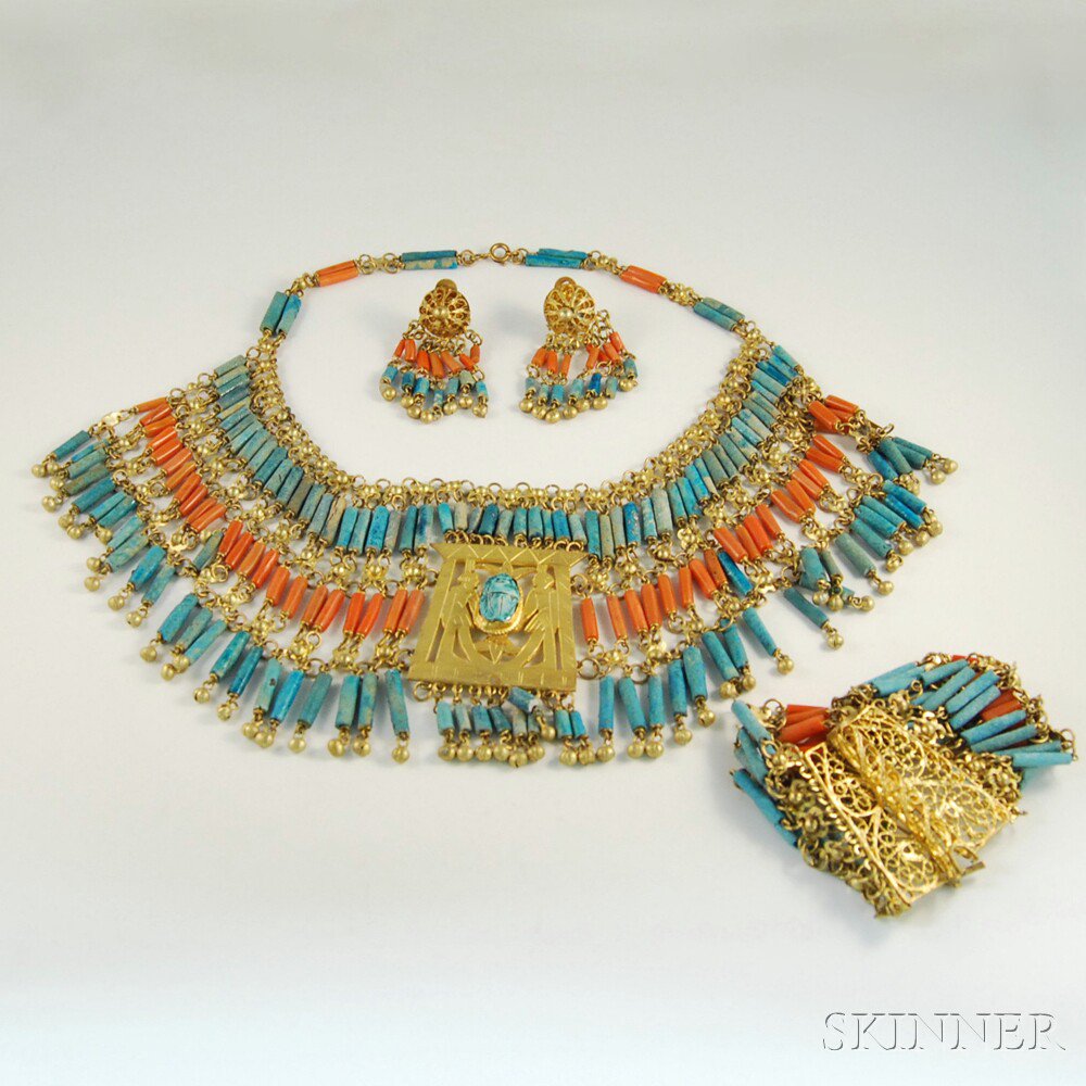 Appraisal: Egyptian-style Gilt Ceramic and Coral Suite composed of beaded collar