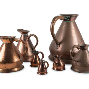 Appraisal: Seven Copper Graduated Pitchers th Early th Century comprising an