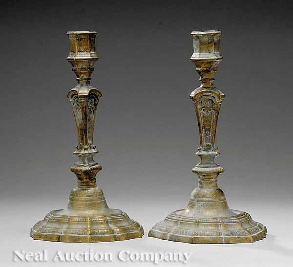 Appraisal: A Pair of George II Brass Candlesticks th c faceted