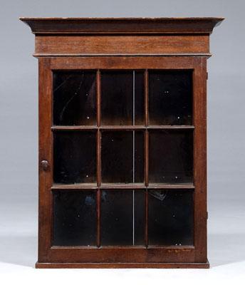 Appraisal: American Federal hanging cabinet walnut glazed door with nine panes