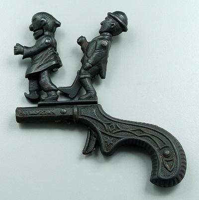 Appraisal: Cast iron novelty pistol marked on barrel quot The Chinese