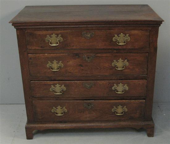 Appraisal: th century oak chest of four long drawers on bracket