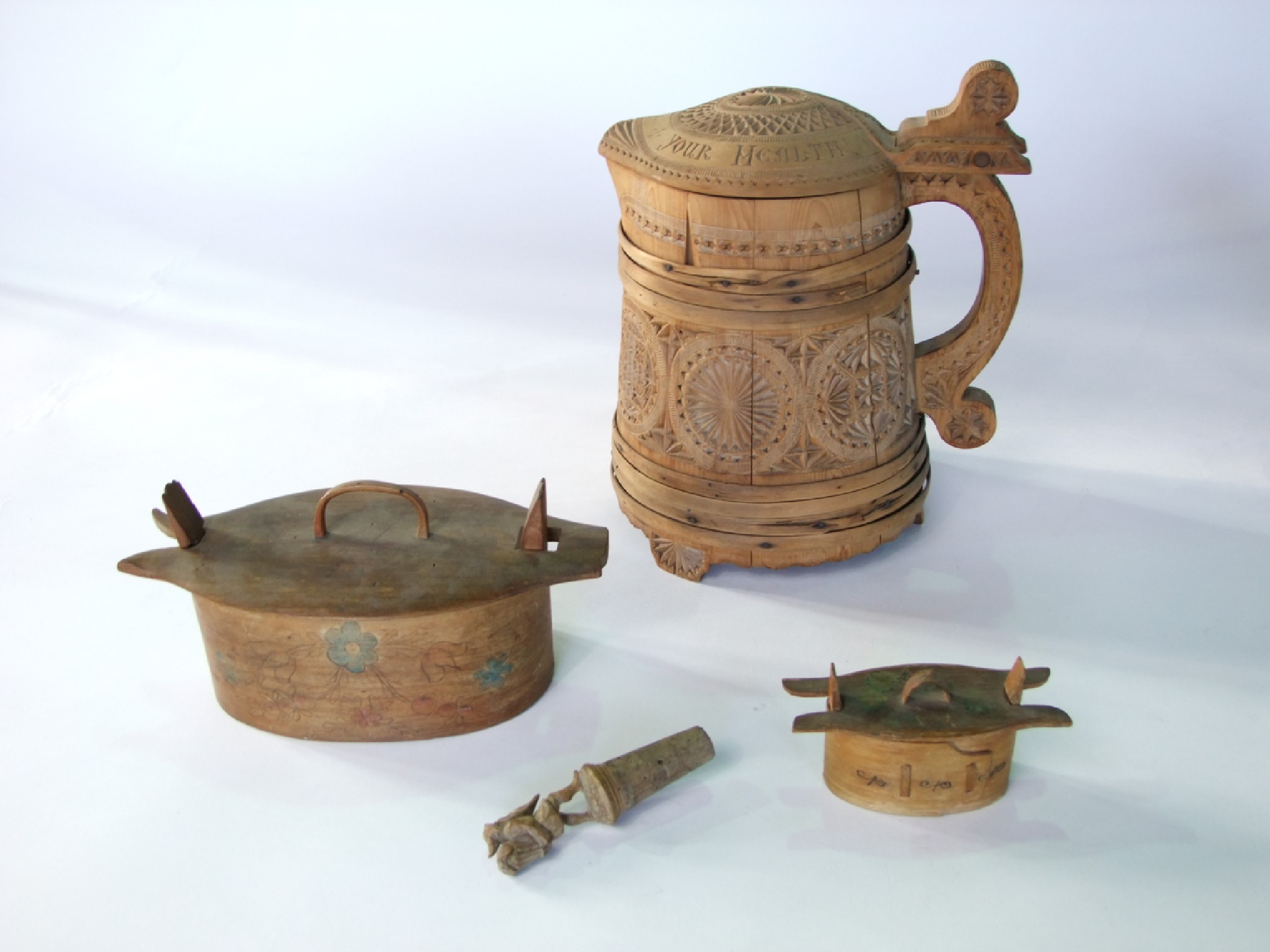 Appraisal: Treen to include an antique Scandinavian peg jug with well