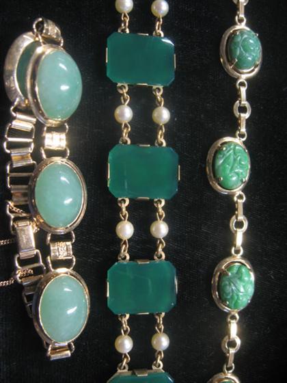 Appraisal: Group of jade bracelets Three jade and glass bracelets in