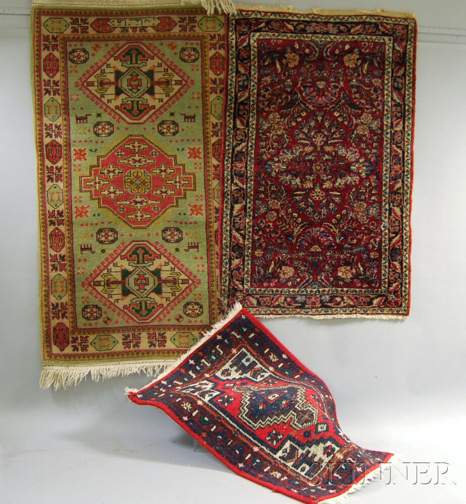 Appraisal: Three Small Oriental Rugs th century ft x ft in