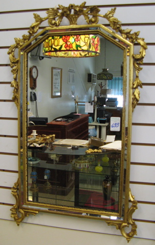 Appraisal: AN ITALIAN GILT WOOD HAND CARVED WALL MIRROR with mirror