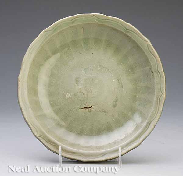 Appraisal: A Southern Chinese or Vietnamese Celadon Barbed Rim Dish late