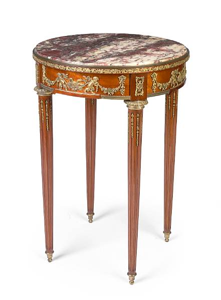 Appraisal: A Louis XVI style gilt bronze mounted mahogany table circa