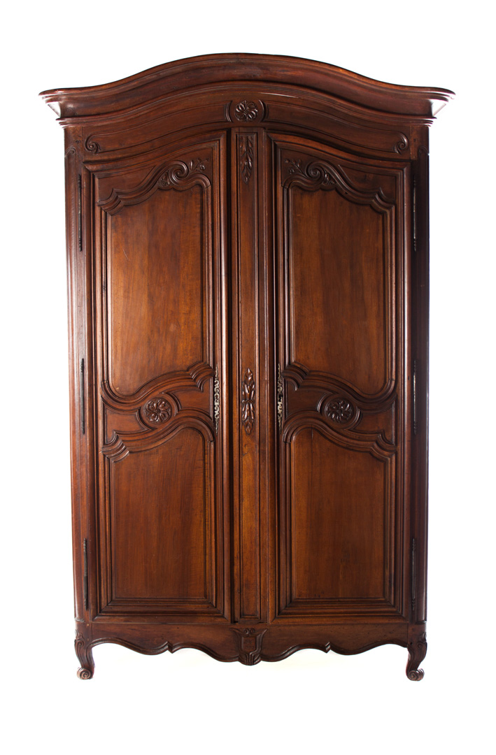 Appraisal: Louis XV Provincial style walnut armoire late th century curved