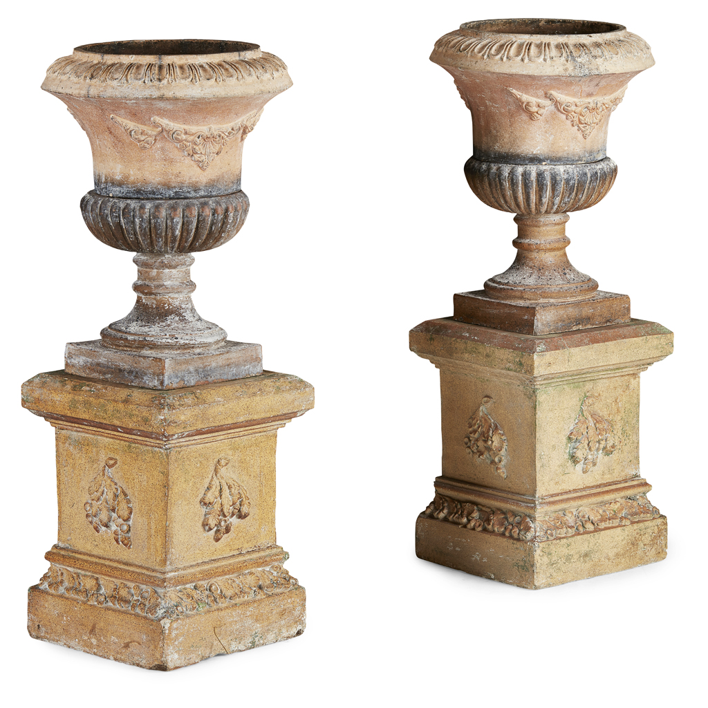 Appraisal: PAIR OF SCOTTISH FIRECLAY URNS ON STANDS TH CENTURY campana