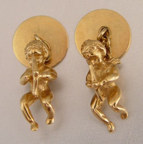 Appraisal: K FIGURAL CHERUB CUFFLINKS K yellow gold cufflinks depicting cherubs