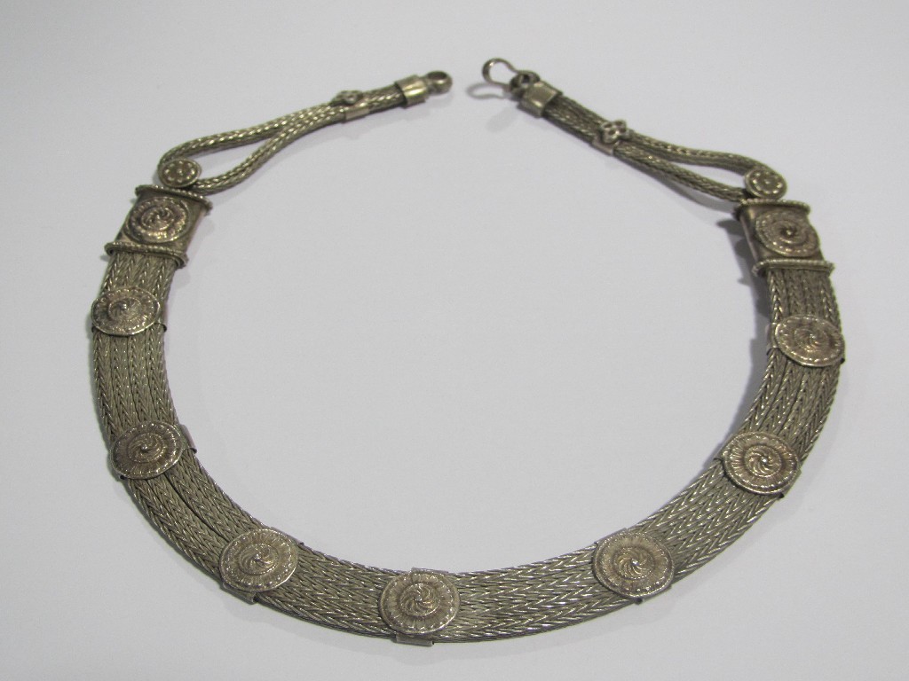 Appraisal: Middle Eastern silver necklace with a four row weave link