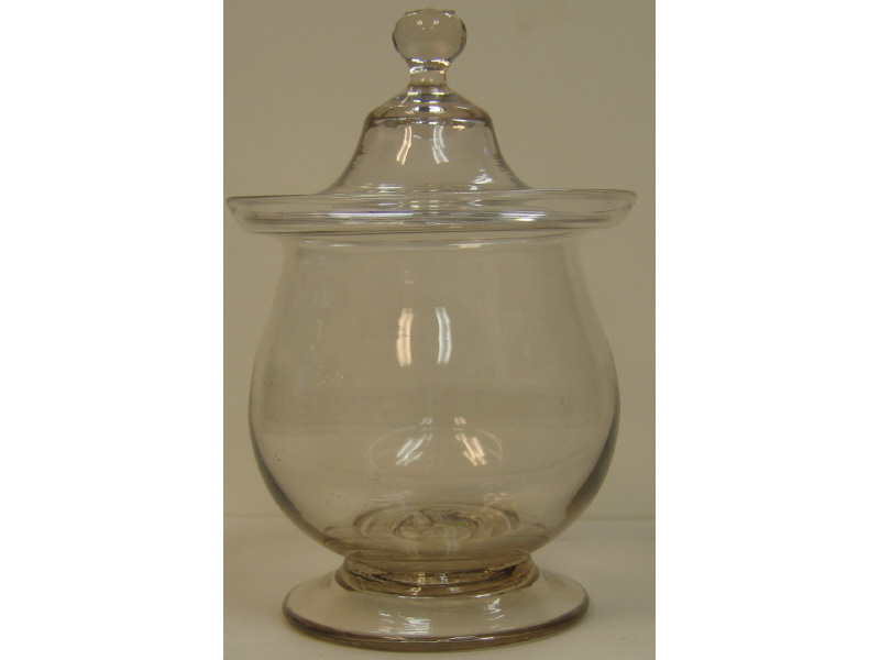 Appraisal: BLOWN GLASS MIDWESTERN LIDDED SUGAR BOWL Colorless domed foot with