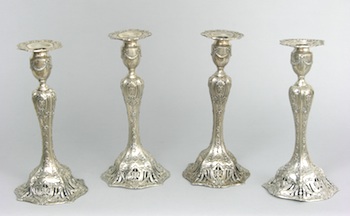 Appraisal: A Set of Four Sterling Candlesticks by Theodore B Starr