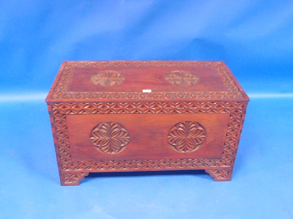 Appraisal: Camphor wood chest with hinged lid with carved leaf design