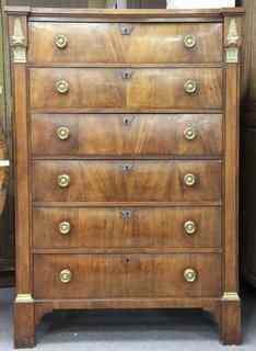 Appraisal: A French th Century tall chest of six long drawers