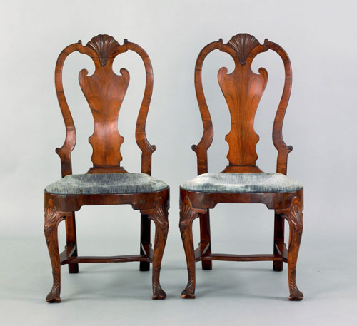 Appraisal: Pair of George II walnut veneer dining chairs ca each