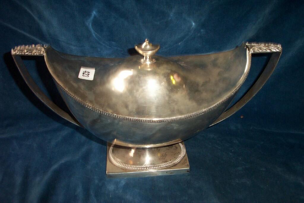 Appraisal: A classical style silver lidded tureen the body of boat