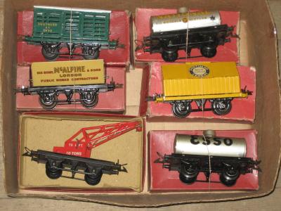 Appraisal: Six Hornby goods trucks comprising S R cattle van McAlpine