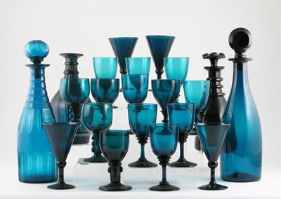 Appraisal: A collection of green glass Comprising four decanters of varying