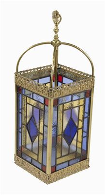 Appraisal: A Victorian brass hall lantern with leaded stained glass panels