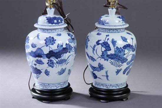 Appraisal: PAIR CHINESE BLUE AND WHITE PORCELAIN VASES Electrified - in