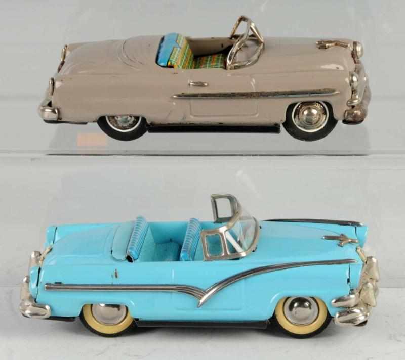 Appraisal: Lot of Tin Automobile Friction Toys Description Japanese Working Both