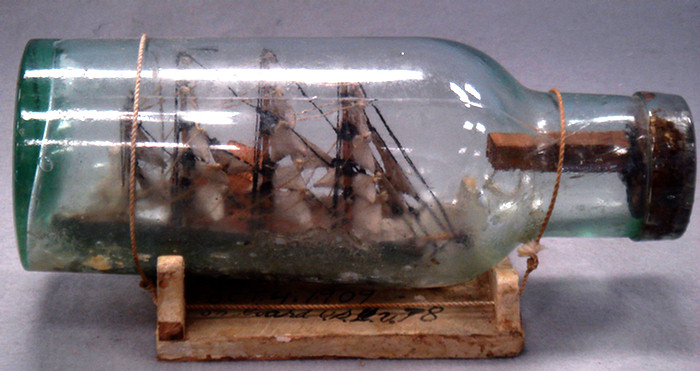 Appraisal: Folk art ship in a bottle with a tag reading