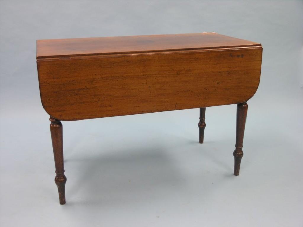 Appraisal: A Victorian mahogany Pembroke table with single frieze drawer on