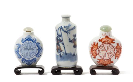 Appraisal: Sale Lot Three Porcelain Snuff Bottles comprising two blue and